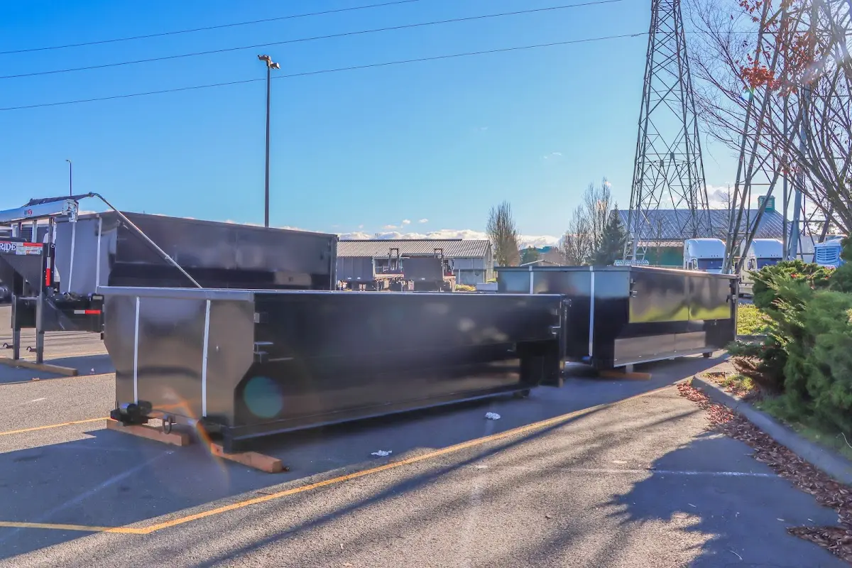 Roll-off dumpster ready for waste disposal at job site for Commercial Dumpster Rental in East Lake